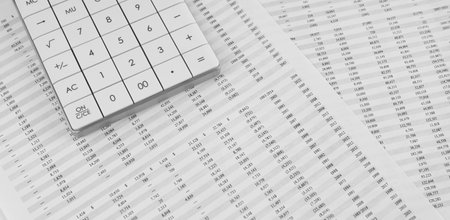 Cose up view of calculator on financial statement. financial and business concept.の写真素材