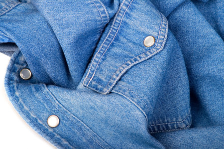 blue jeans shirt close-up on the white backgroundの写真素材