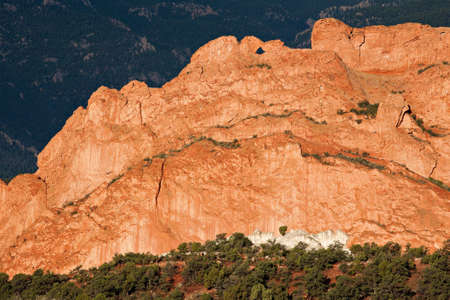 Morning light illuminates the Kissing Camels rock formation in Colorado Springs' Garden of the Gods park.の写真素材