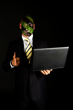 jungle camouflage paint businessman withの写真素材