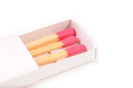 Red matches in a white box