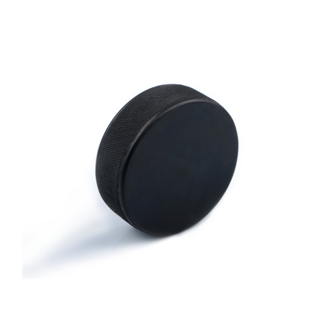 Hockey puck isolated on white backgroundの写真素材