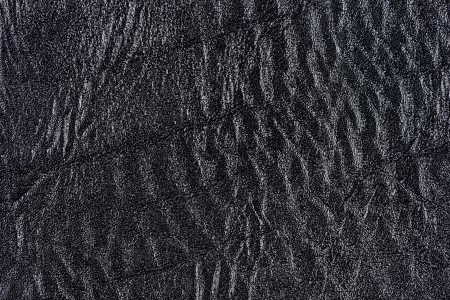 Black synthetic leather with embossed