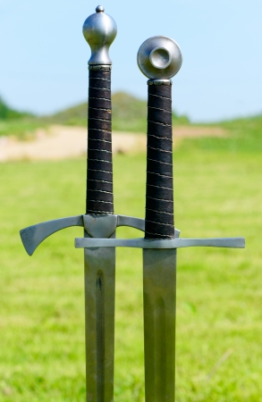 Two medieval swordの写真素材