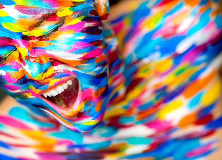 Portrait of the bright beautiful emotional woman with art make-upの写真素材