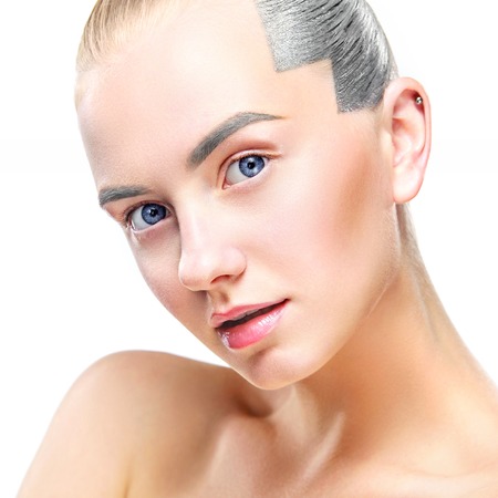 Close-up portrait of sexy blonde girl with makeup. Beautiful model, silver hairstyle. isolated on white background. For cosmetics advertisment.の写真素材