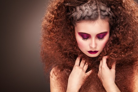 Beautiful girl with amazing hairstyle. Advertisment print for hairdressers.の写真素材