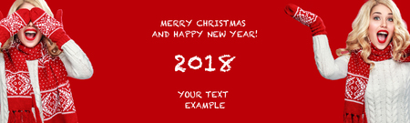 Beautyful blond woman with christmas box gift on red background.の写真素材