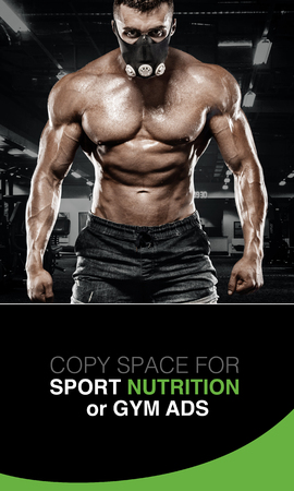 Athletic shirtless young sports man - fitness model with barbell in gym.の写真素材