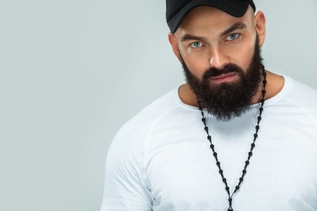 Close-up portrait of a brutal bearded manの写真素材