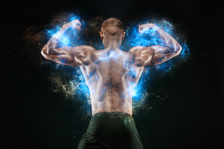 Bodybuilding competitions on the scene. Man sportsmen bodybuilder physique and athlete. Fitness motivation.の写真素材