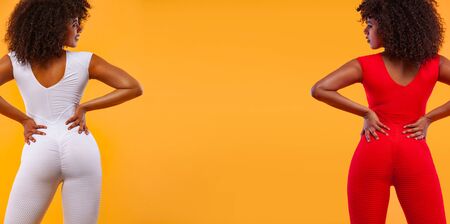 Back of strong athletic woman with black skin and curly hair, doing exercise on white background wearing red sportswear. Fitness and sport motivation.の写真素材
