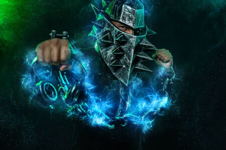Mysterious man in a helmet with a bat and chains in black wear. Fantasy book or computer game cover...