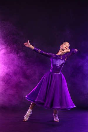 Girl athlete dancing sports ballroom dancing.の写真素材