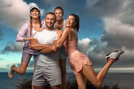 Certified group exercise instructor and his team. Premium high resolution photo Smiling women and...