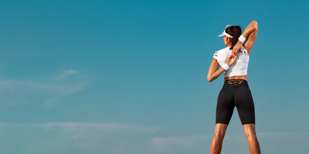 Banner photo for atlethics website. Athlete woman on template for site header.の写真素材