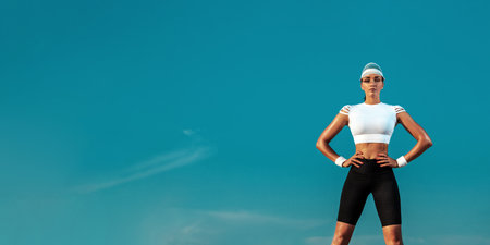 Image for fitness advertisement. Picture of sporty girl on banner background.の写真素材