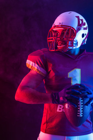 American football player banner in neon lights. Template for bookmaker ads with copy space. Mockup for betting advertisement. Sports betting, football betting, gambling, bookmaker, big winの写真素材