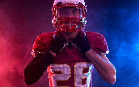 American football player teenager. Banner with neon colors. Template for bookmaker ads with copy space. Mockup for betting advertisement. Sports betting, football betting, gambling, bookmaker, big winの写真素材