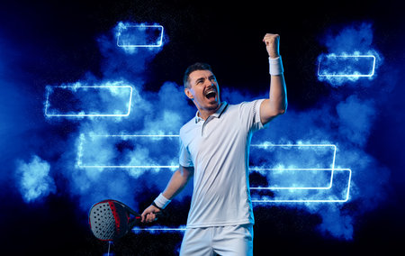 Padel tennis player with racket. Man athlete with paddle racket on court with neon colors. Sport concept. Download a high quality photo for the design of a sports app or website.の写真素材