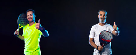 Set of padel tennis player with racket. Man athlete with paddle racket on black background. Sport concept. Download a high quality photo for sports website.の写真素材
