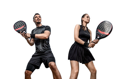 Family team. Group of two padel tennis players with racket. Woman and man athletes with paddle racket isolated on white background. Sport concept. Download a high quality photo for a sports app.の写真素材