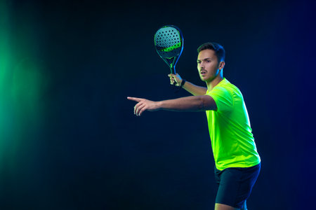 Tennis player banner on the black background. Tennis template for ads with copy space. Mockup for betting advertisement. Sports betting on tenisの写真素材