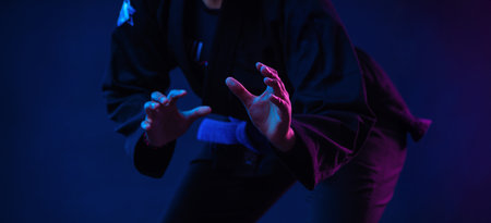 Close up photo of Brazilian girl Jujutsu fighter is ready for the Jiu Jitsu wrestling competition. Brazilian sport ju-jitsu. Mixed martial arts.の写真素材
