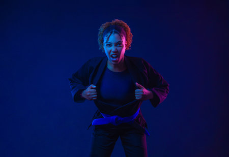 Brazilian girl Jujutsu fighter is ready for the Jiu Jitsu wrestling competition. Brazilian sport ju-jitsu. Mixed martial arts.の写真素材