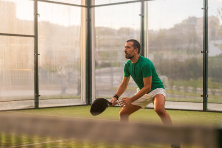 Padel Player in Action During Match, Sports Editorial or Event Promotionの写真素材