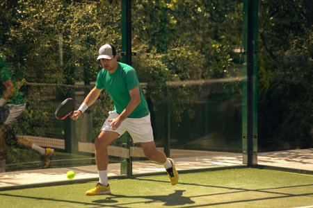 Padel player showcasing professional gear, perfect for online store banners, padel championship ads, or branded social media campaignsの写真素材