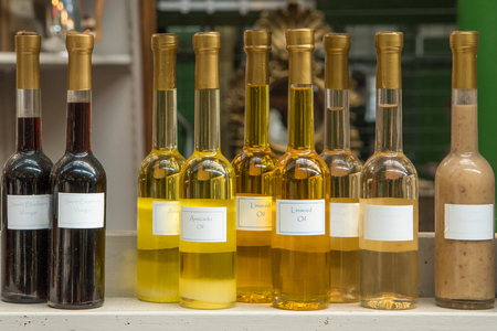 Vinegar and oils on sales at a food stall in the Borough Market Londonの写真素材