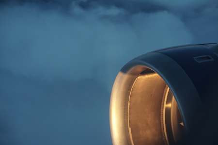 Airplane engine illuminated by the sunの写真素材