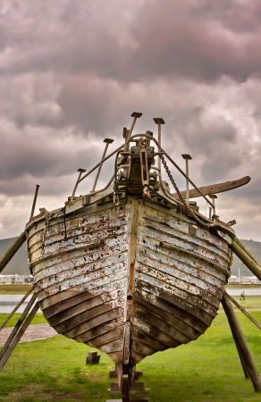 wooden sailing boat on blocks being repairedの写真素材