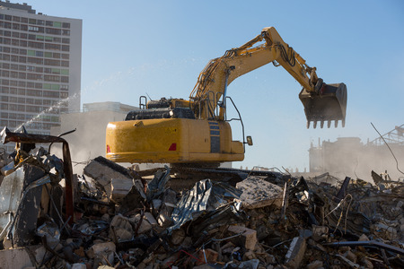 Excavator working on a demolition site
