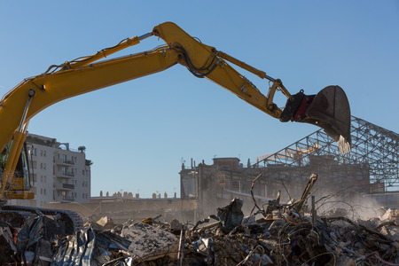 Excavator working on a demolition siteの写真素材
