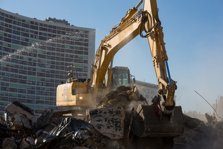 Excavator working on a demolition siteのeditorial素材