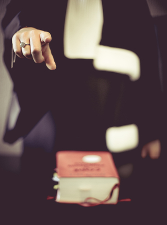 Woman lawyer attorneywearing classic french black white gownの写真素材