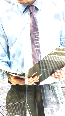 Abtract business concept / A businessman mixed with cityscapeの写真素材