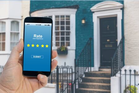 Application rating concept - Person rating with smartphone on screen