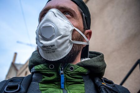 Man with protective medical mask FFP2 against virus Covid-19 or coronavirusの写真素材