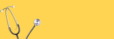 Medical banner, concept with stethoscope isolated on yellow backgroundの写真素材