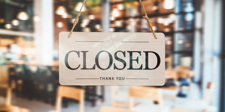 Closed sign in front of the cafe and restaurant doors, new ban on receiving customersの写真素材