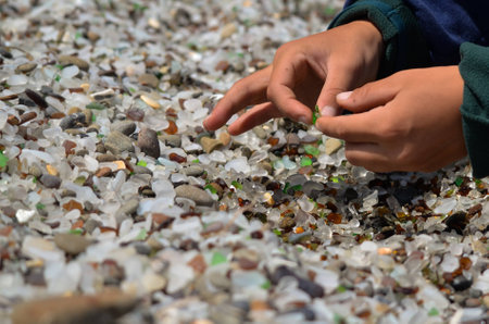 child holding sea glass