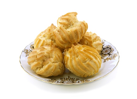 Cookies on a small plate. White backgroundの写真素材