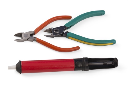 Cutting Pliers and syringe for suctioning the solder.の写真素材