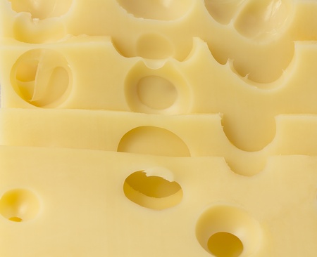 piece of cheese isolated on a white background の写真素材