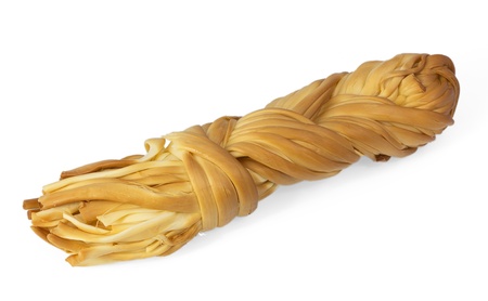 The dairy smoked braided cheese on a white background の写真素材