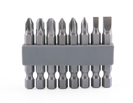 Various bits in a row in the bit holder on white backgroundの写真素材