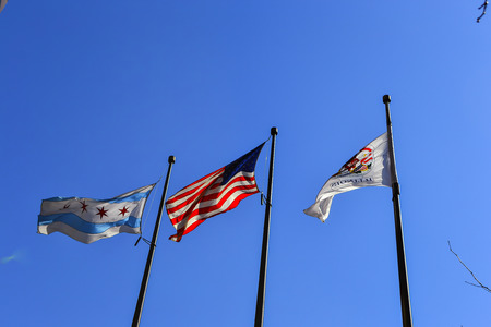 Illinois State Flag, US Flag, and Chicago Flag waving in breeze.の写真素材